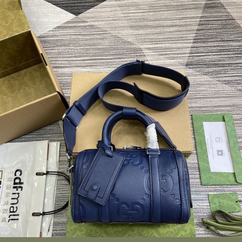 G*u*i top handle bags